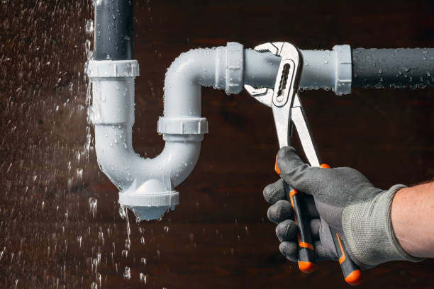 Professional Plumbing technician working in Mastic, NY